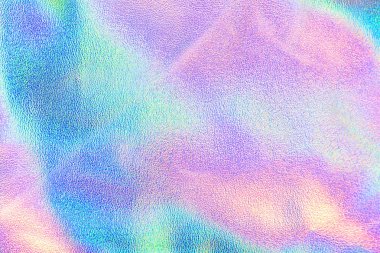 Çizikler ve usulsüzlükler ile mavi pembe yeşil renklerde holografik gerçek doku