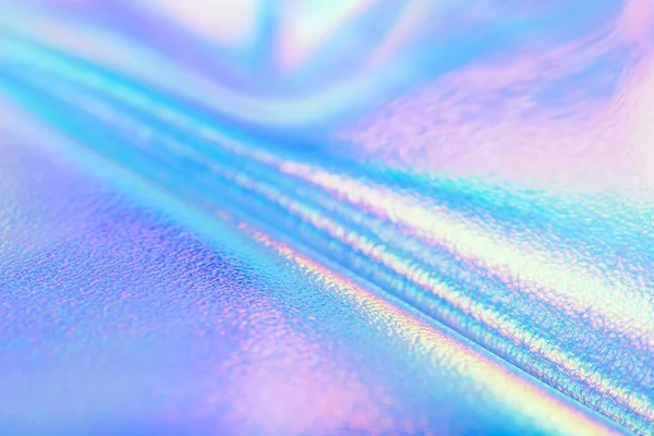 Bright real holographic foil texture in pastel neon colors — Stock Photo, Image