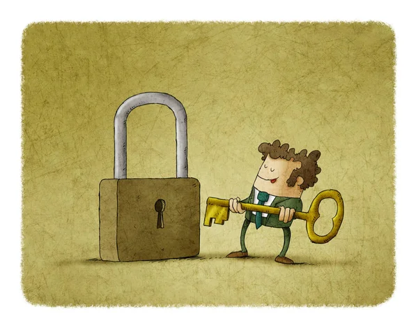 Business man in front of a huge padlock tries to insert a key — Stock Photo, Image