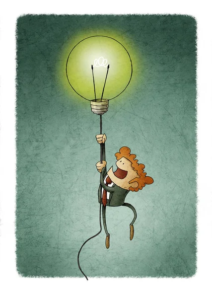 Businessman flying on a light bulb as a symbol of creativity. — Stock Photo, Image
