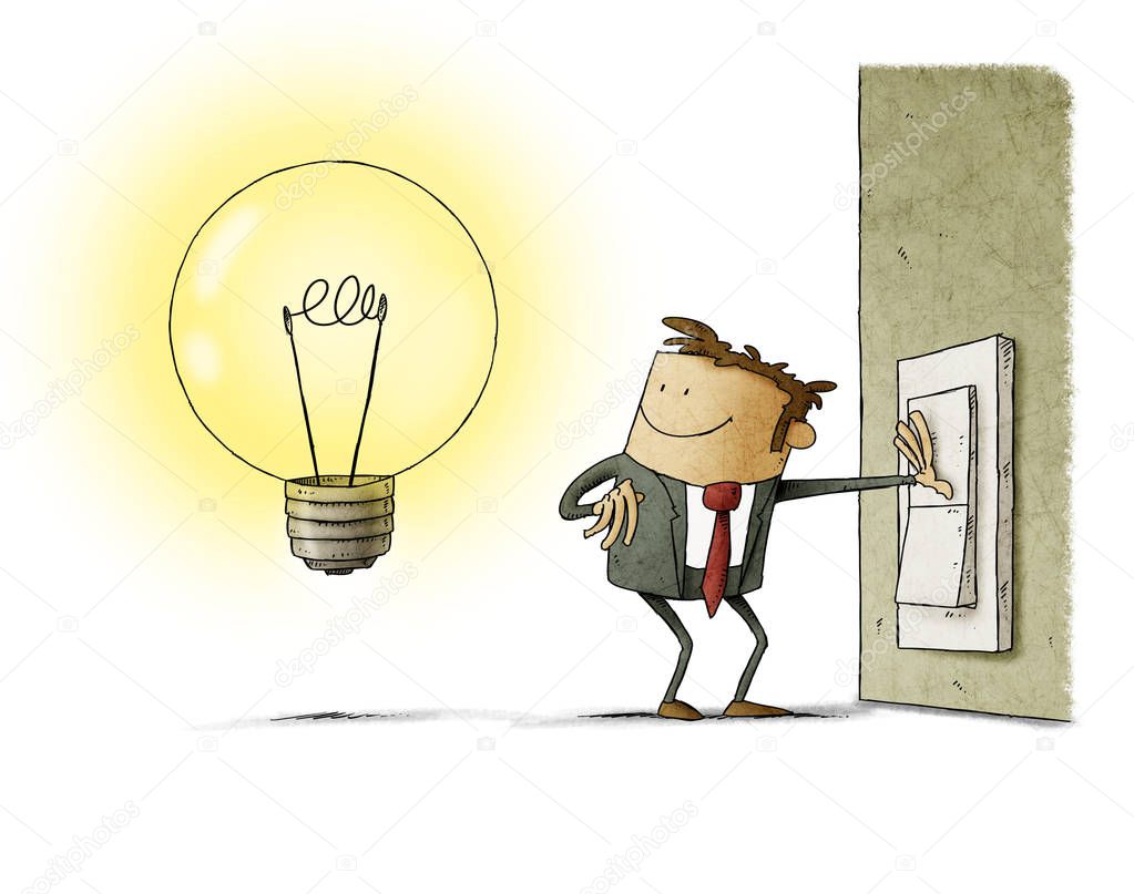 Businessman presses a switch and turns on a light bulb symbol of having an idea. isolated