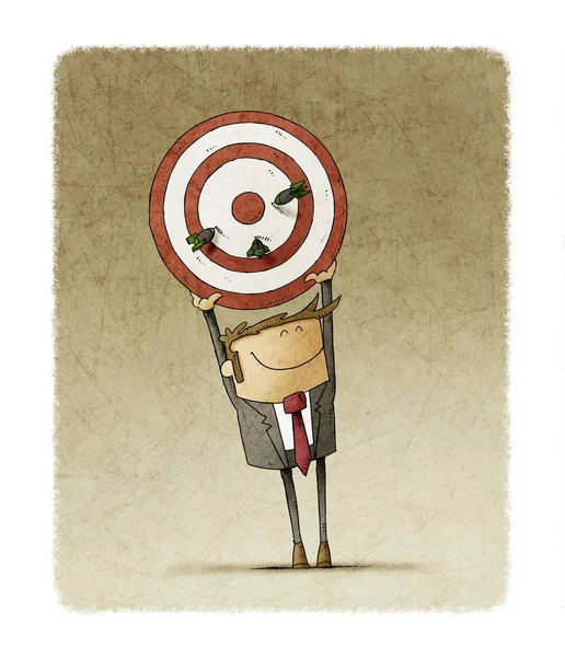 Business man holds up a target that has three darts stuck. Human resources concept. — Stock Photo, Image