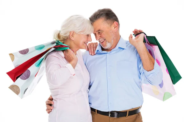 Senior coppia holding shopping borse — Foto Stock