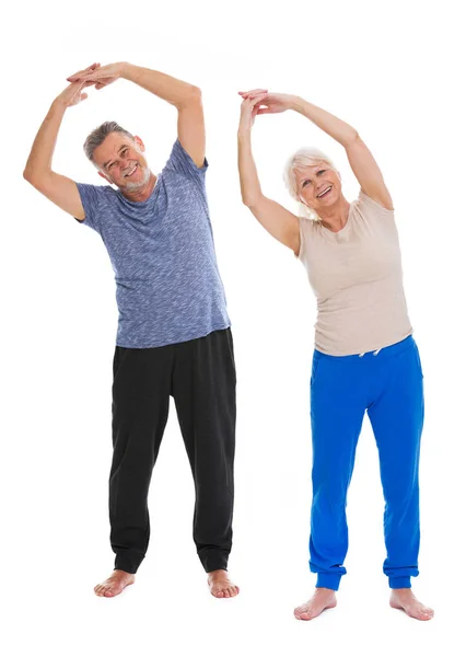 Seniors doing fitness exercises — Stock Photo, Image