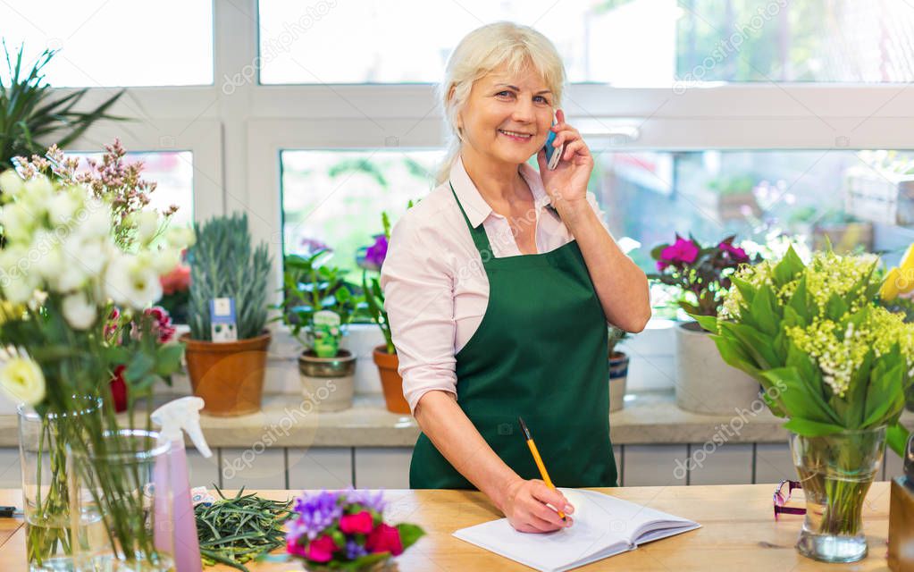 Woman working in florist shop