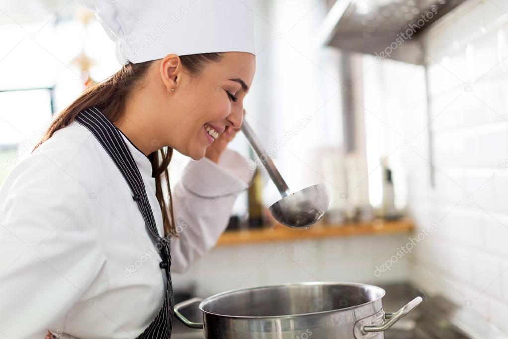 Female chef in kitchen