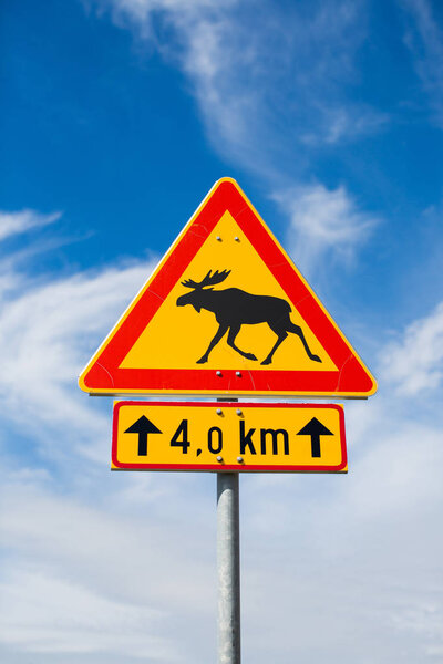 Moose on a road sign, Finland