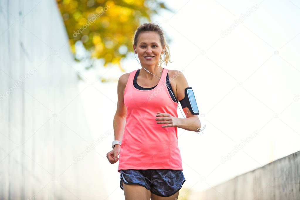Woman running in urban area