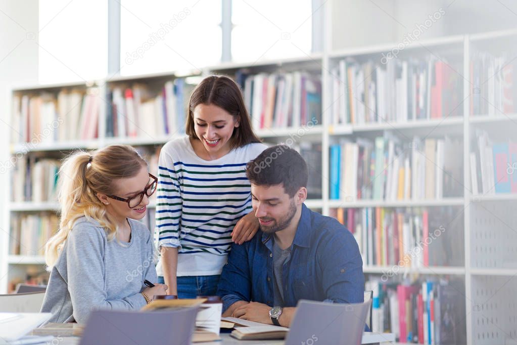 University students working in the library at campus