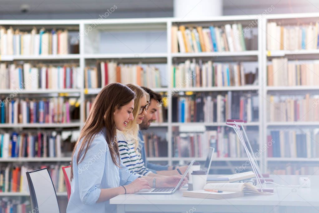 University students working in the library at campus