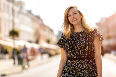 Beautiful young woman in an urban city area 