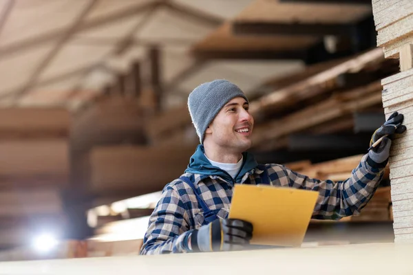 Young Male Worker Timber Warehouse — ストック写真