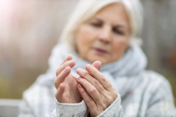 Senior Woman Arthritis Rubbing Hands — Stock Photo, Image