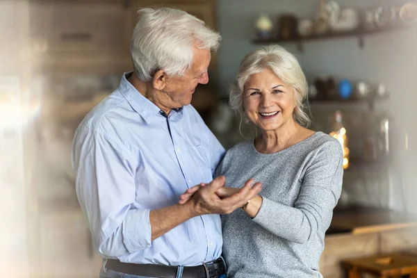 Senior Couple Dancing Together Home — Stockfoto