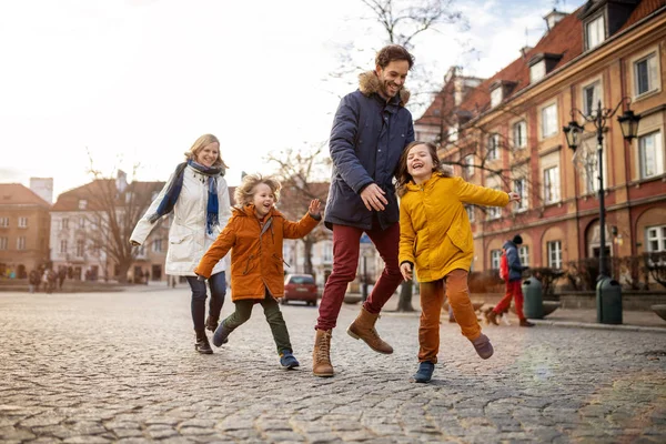 Affectionate Young Family Enjoying Winter Day City — Stock Photo, Image