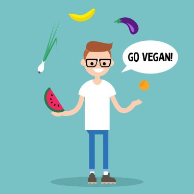 Modern bir yaşam tarzı. Vegan gidin. Genç nerd hokkabazlık meyve ve sebze
