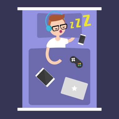 Yeni teknolojileri bağımlılığı. onun gad ile uyuyan genç nerd