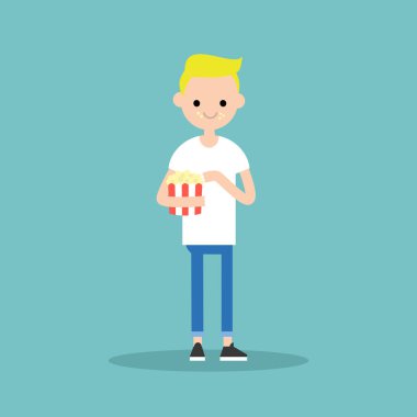 Genç sarışın çocuk patlamış mısır çiğneme / tam uzunlukta karakter. düz ve