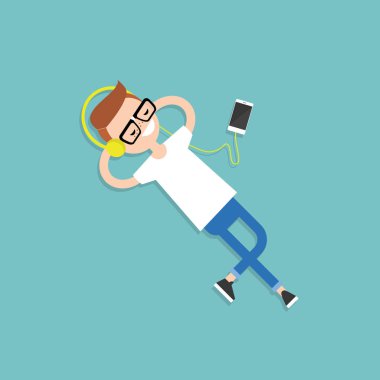 Bir katta müzik dinlerken kulaklık ile mutlu genç nerd. 