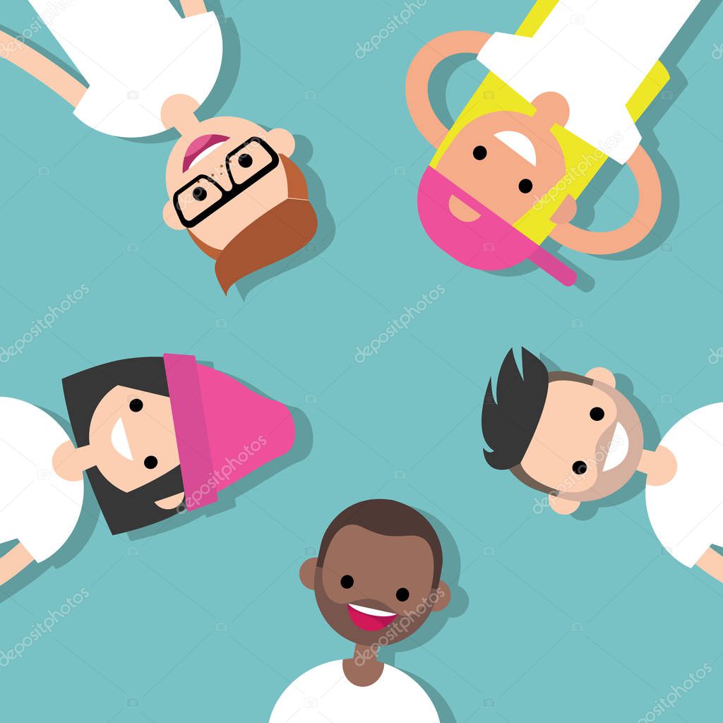 Top view of the group of millennials lying on the floor / flat e