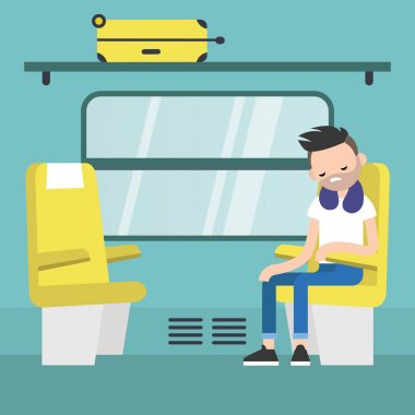 Genç yolcu oturarak içinde tren bölme / düzenlenebilir düz