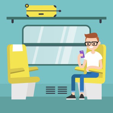 Genç yolcu oturarak içinde tren bölme / düzenlenebilir düz