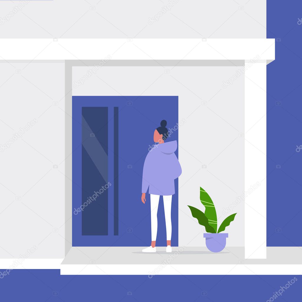 Young female character standing next to a front door, building e