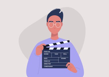 Film yapımcılığı, genç erkek karakter elinde bir klemp, video endüstrisi.