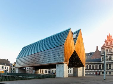 Ghent, Belgium April 9, 2020: The city pavilion next to the Belfry and Saint Nicholas church clipart