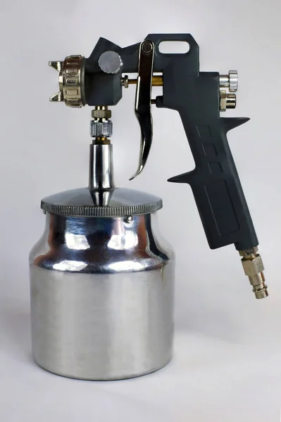 Air paint gun with metal can — Stock Photo, Image