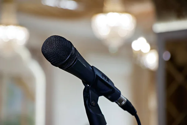 Wedding meeting and event on stage concept - Close up microphone. on stage of business meeting or event whit flare light effect and copyspace.