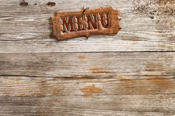 Retro style menu sign nailed on aged wooden background — Stock Photo, Image