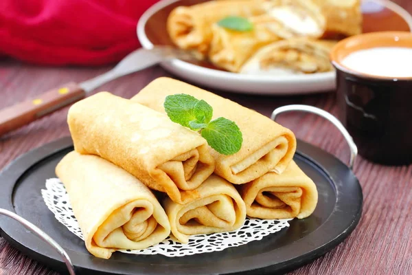 Rolled pancakes with cottage cheese Royalty Free Stock Photos