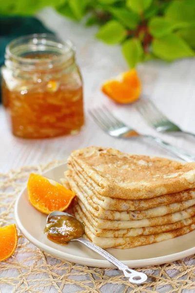 Pancakes with orange jam and fruit — Stock Photo, Image