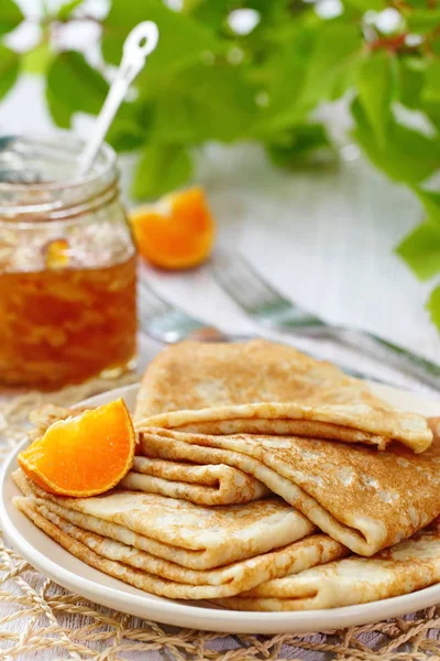 Pancakes with orange jam and fruit — Stock Photo, Image