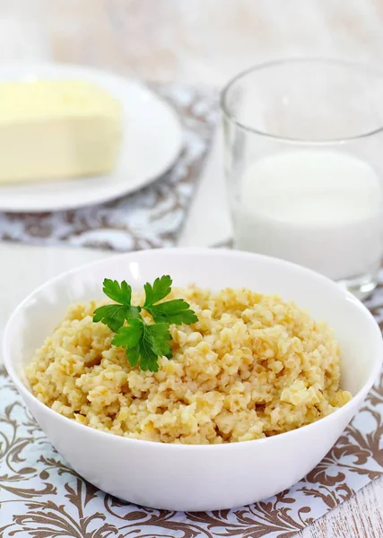 Wheat porridge with butter — Stock Photo, Image