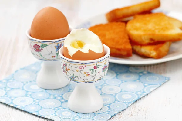 Boiled eggs and toasts for breakfast — Stock Photo, Image