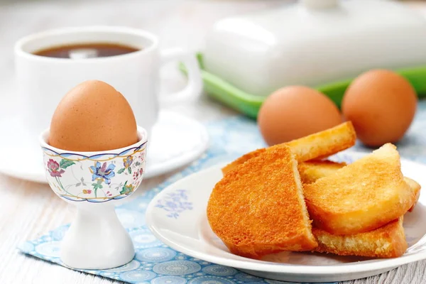 Boiled eggs and toasts for breakfast — Stock Photo, Image