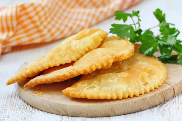 National cuisine. Fried meat pie cheburek — Stock Photo, Image