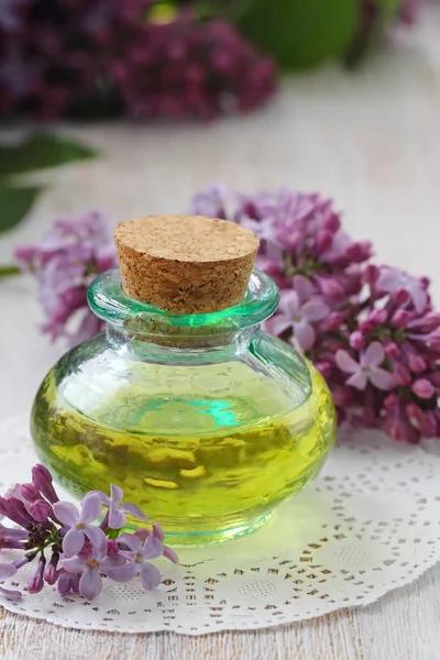 Lilac essential aroma oil — Stock Photo, Image