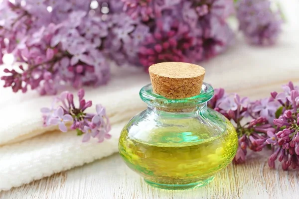 Lilac essential aroma oil — Stock Photo, Image