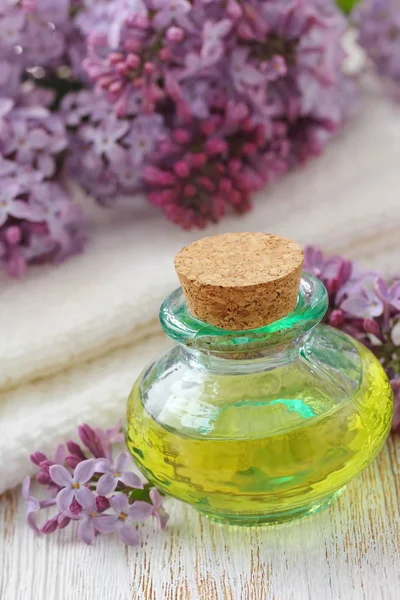 Lilac essential aroma oil — Stock Photo, Image