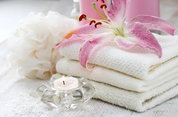 Setting with SPA assortment and lilies — Stock Photo, Image