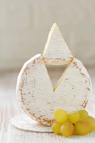 Brie type of cheese and grape. Camembert cheese. — Stock Photo, Image