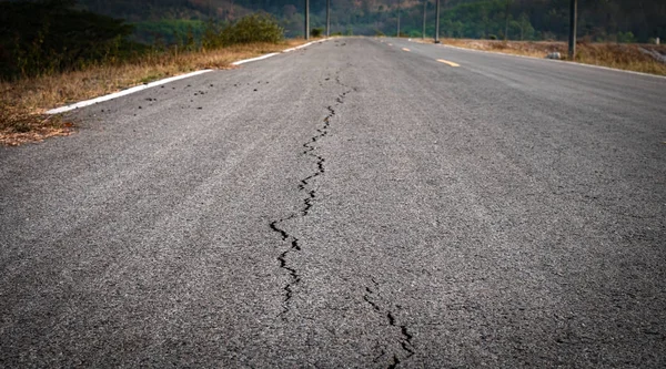 Asphalt road with crack