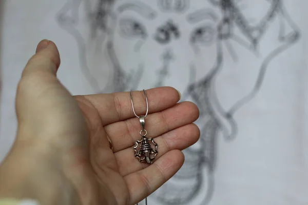 Rope necklace with bless pendant in hindu god ganesh shape — Stock Photo, Image