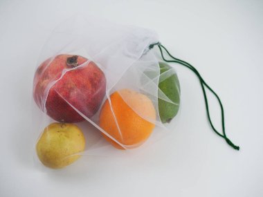 colorful fruits in an eco bag. the concept of zero waste