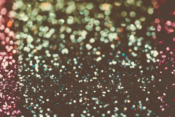 Feestelijke multicolor en blauwe glitters achtergrond met bokeh en licht lek effect — Stockfoto