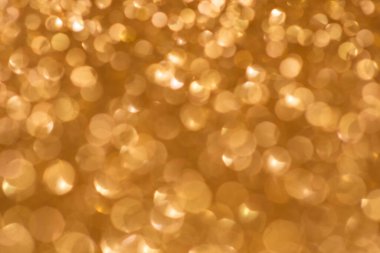 Altından parıltılı bokeh dokusu metin için: noel, kutlama, parti, davetiye soyut arkaplan