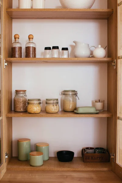 Stocked and organiswd kitchen cupboard. cooking from pantry — Stock Photo, Image